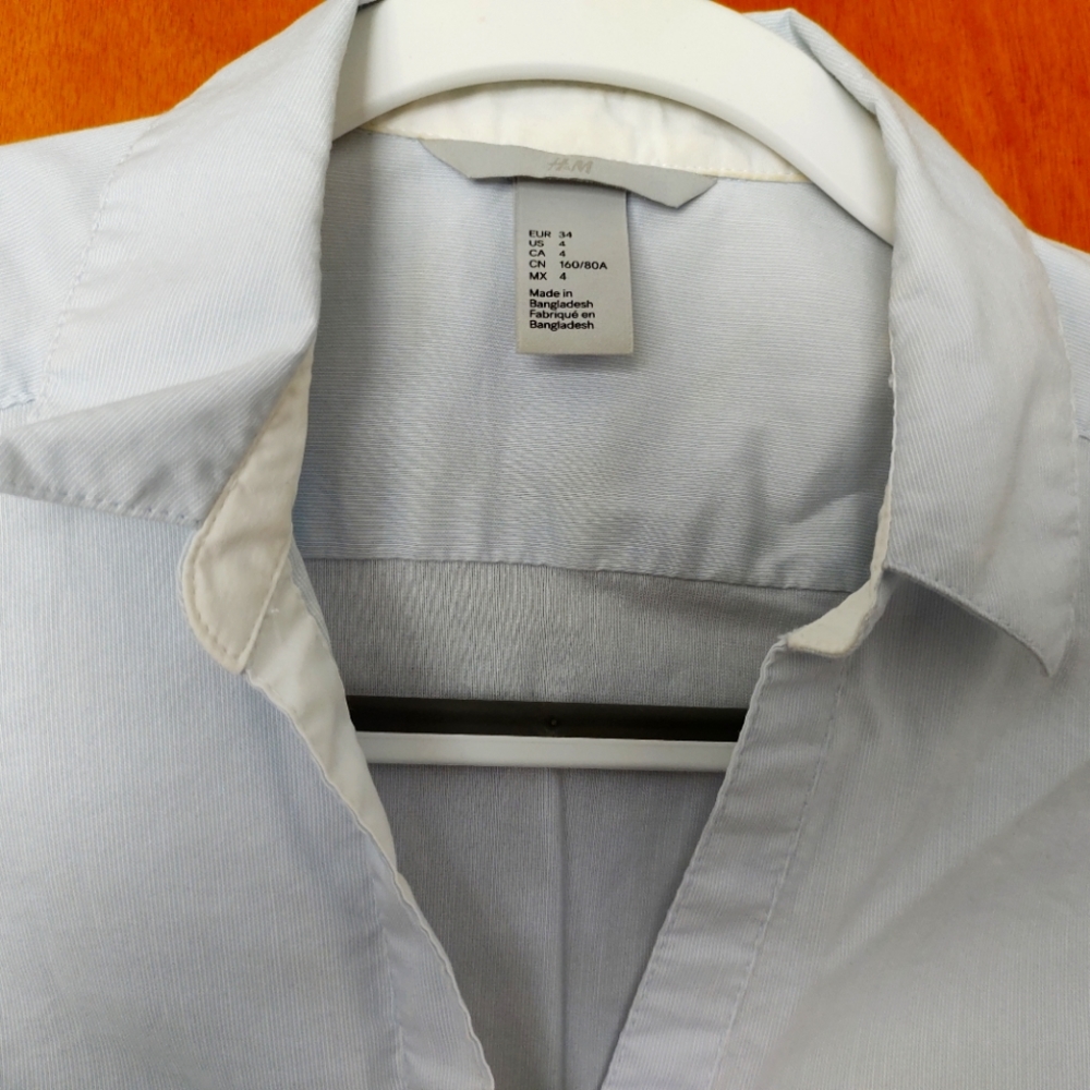 H&M Women's Tailored blouse. Blue and white micro-stripe.